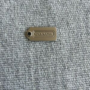Coach Metallic silver matte finish tag